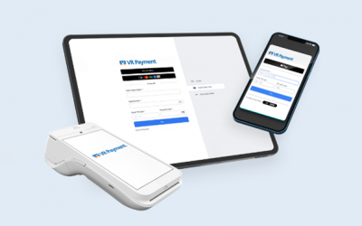 Omnichannel-Zahlung: Ein Laptop und ein Smartphone zeigen das VR-Payment-Bezahlformular, davor liegt ein VR-Payment-Kartenterminal